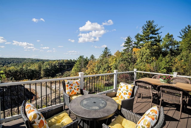20 Del Ray Dr, Windham, NH 03087 - deck with outdoor dining space and a view of trees