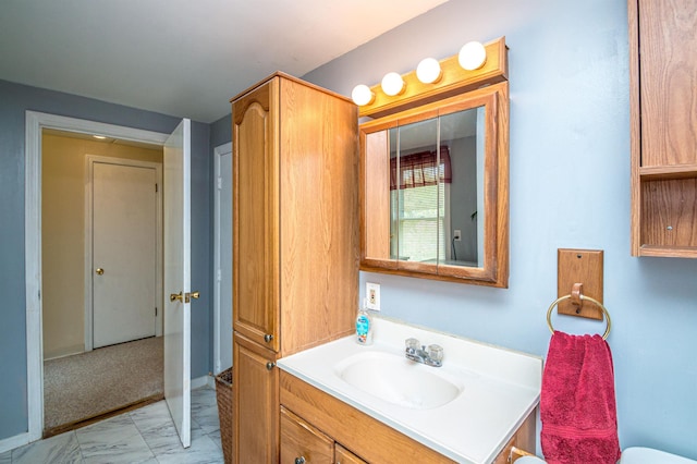 59 Lake Rd, Wakefield, NH 03872 - bathroom featuring marble look tiles and vanity
