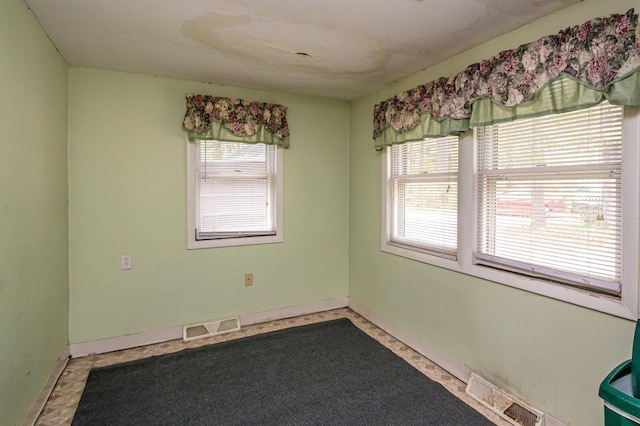 59 Lake Rd, Wakefield, NH 03872 - spare room with plenty of natural light and baseboards