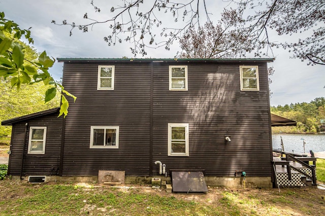 59 Lake Rd, Wakefield, NH 03872 - view of side of home featuring a water view