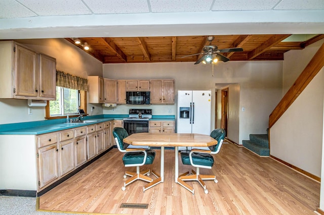 59 Lake Rd, Wakefield, NH 03872 - kitchen featuring black microwave, white refrigerator with ice dispenser, electric stove, a ceiling fan, and light wood-style floors