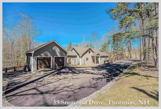 view of front of home with a garage