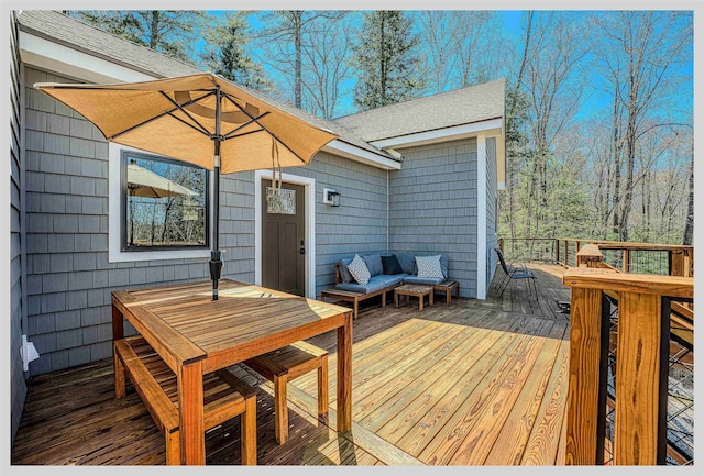deck with outdoor dining space