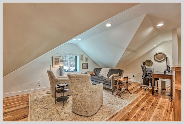 living room with light wood-style floors, vaulted ceiling, recessed lighting, an office area, and baseboards