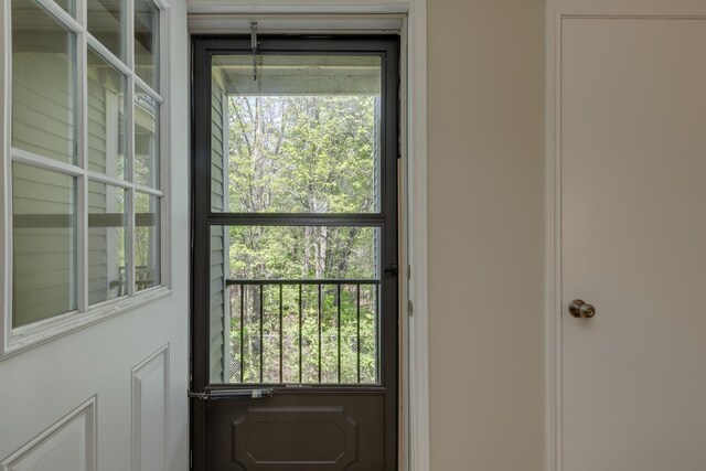 doorway to outside with healthy amount of natural light