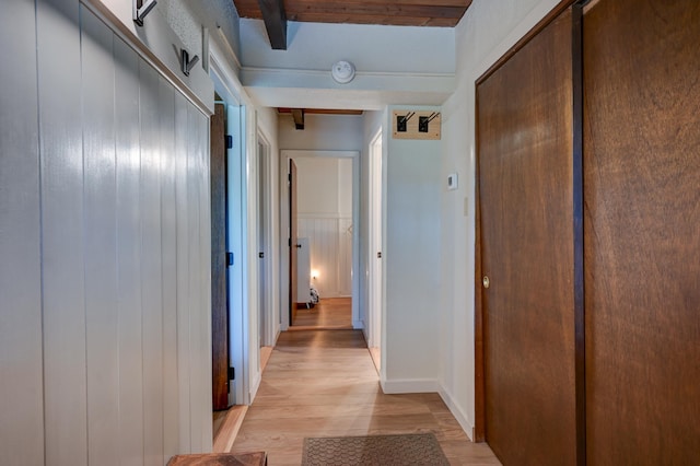 corridor with light wood-type flooring