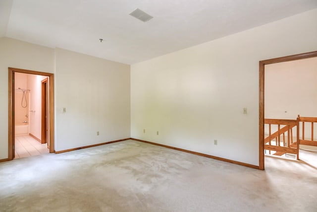 52 Ridgewood Dr Unit 14C, Atkinson, NH 03811 - unfurnished room with light carpet, baseboards, vaulted ceiling, and a pendent fire sprinkler