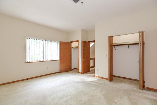 52 Ridgewood Dr Unit 14C, Atkinson, NH 03811 - unfurnished bedroom featuring light colored carpet and baseboards