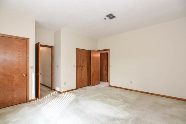52 Ridgewood Dr Unit 14C, Atkinson, NH 03811 - unfurnished bedroom featuring light carpet and baseboards