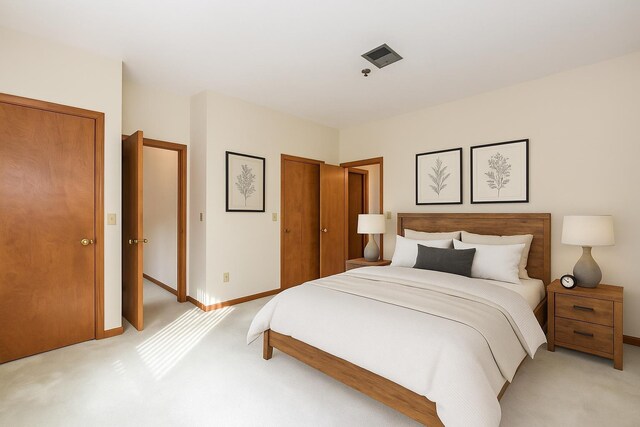 52 Ridgewood Dr Unit 14C, Atkinson, NH 03811 - bedroom with light colored carpet and baseboards