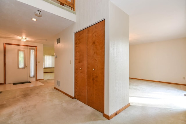 52 Ridgewood Dr Unit 14C, Atkinson, NH 03811 - entrance foyer featuring carpet and baseboards