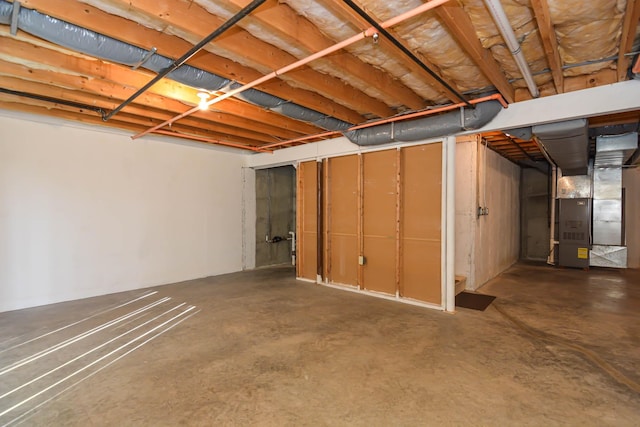 52 Ridgewood Dr Unit 14C, Atkinson, NH 03811 - unfinished basement with heating unit