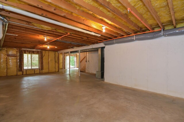 52 Ridgewood Dr Unit 14C, Atkinson, NH 03811 - basement featuring stairway