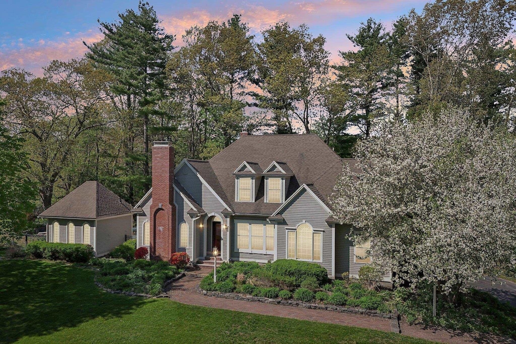 7 Golfview Rd, Windham, NH 03087 - view of front of home with a yard and a chimney