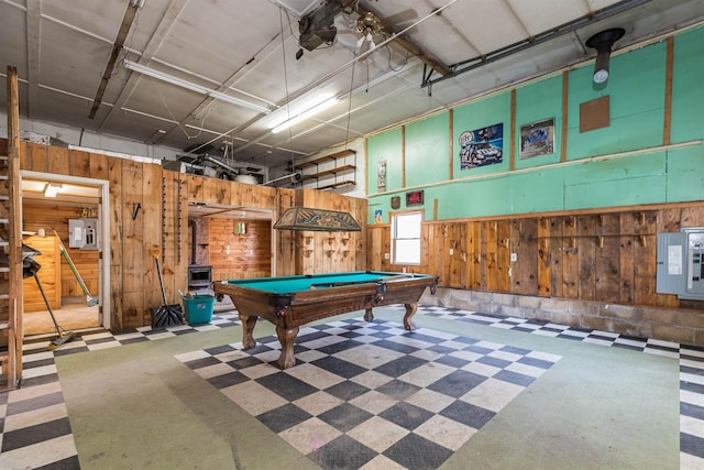 recreation room with wood walls, tile patterned floors, and pool table