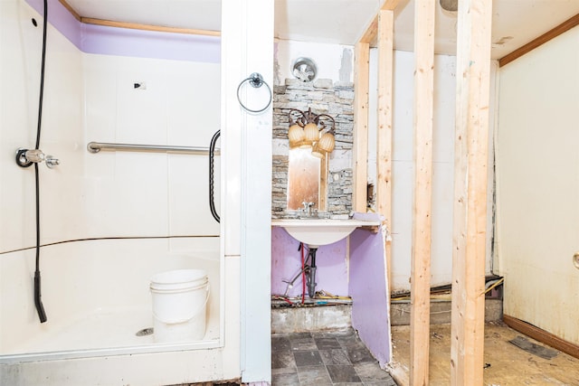 bathroom featuring a shower