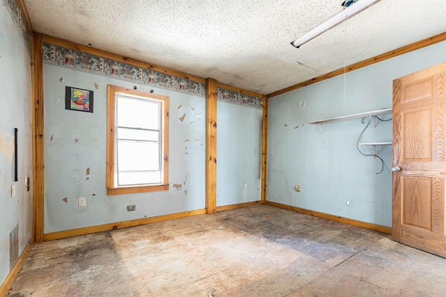 empty room with baseboards