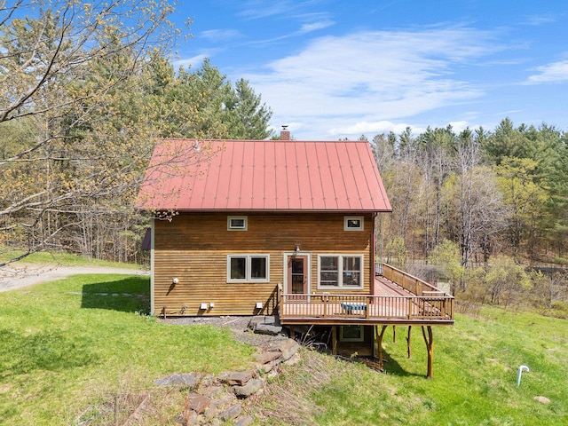 153 Wood Rd, Middlesex, VT 05682 - rear view of property with a deck, a chimney, a lawn, and a standing seam roof