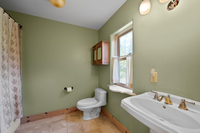 153 Wood Rd, Middlesex, VT 05682 - full bath featuring a sink, baseboards, toilet, and curtained shower