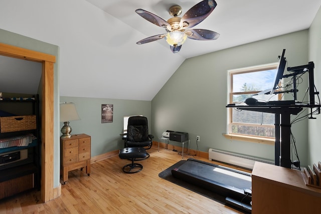 153 Wood Rd, Middlesex, VT 05682 - exercise area featuring a baseboard radiator, vaulted ceiling, wood finished floors, ceiling fan, and baseboards