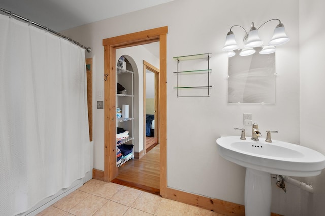 153 Wood Rd, Middlesex, VT 05682 - full bathroom with tile patterned flooring, a shower with shower curtain, and baseboards