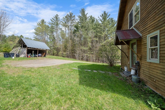 153 Wood Rd, Middlesex, VT 05682 - view of grassy yard with an outbuilding