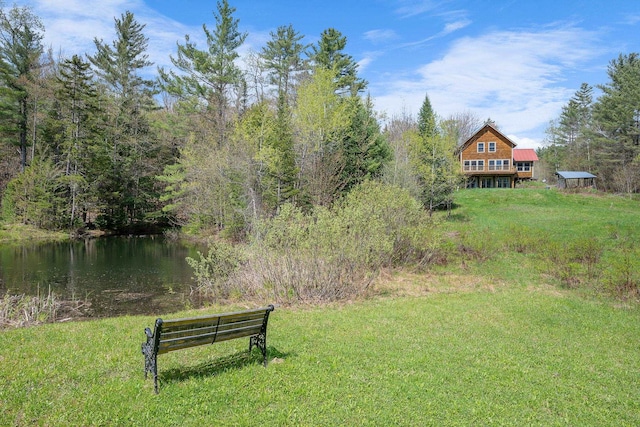153 Wood Rd, Middlesex, VT 05682 - view of green lawn featuring a water view and a wooded view