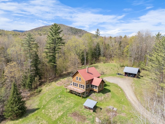 153 Wood Rd, Middlesex, VT 05682 - view from above of property with a heavily wooded area and a mountain backdrop