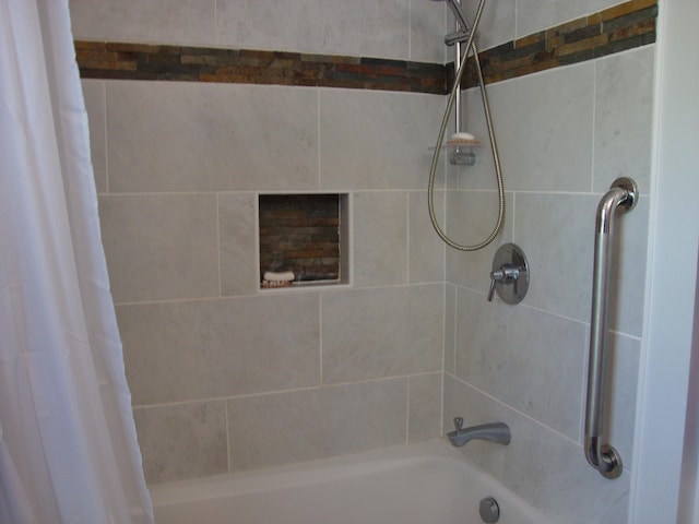 full bath with shower / bath combination with curtain