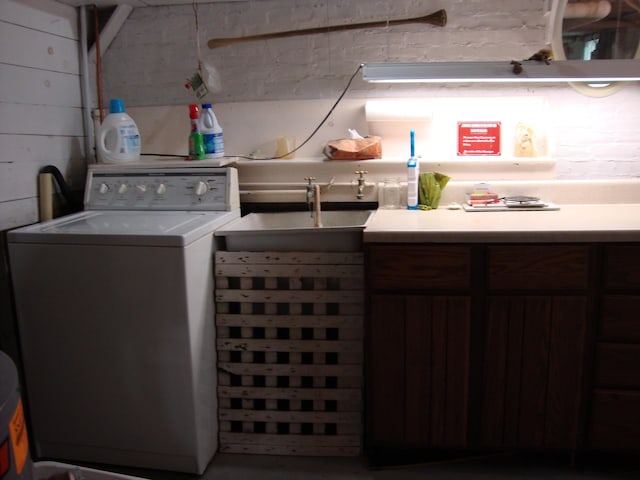 clothes washing area featuring washer / clothes dryer