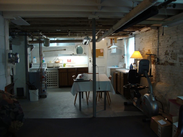 below grade area featuring washing machine and dryer