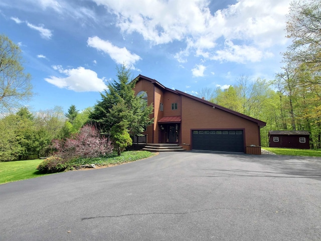 644 Methodist Hill Rd, Enfield, NH 03748 - view of front facade featuring asphalt driveway and a garage