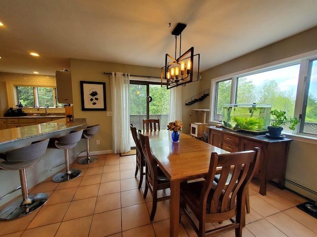 644 Methodist Hill Rd, Enfield, NH 03748 - dining space featuring plenty of natural light, light tile patterned floors, recessed lighting, baseboards, and a chandelier