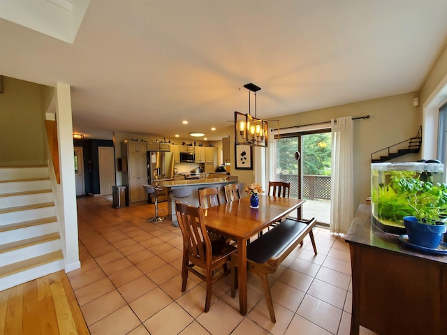 644 Methodist Hill Rd, Enfield, NH 03748 - dining area with stairs, light tile patterned floors, a chandelier, and recessed lighting