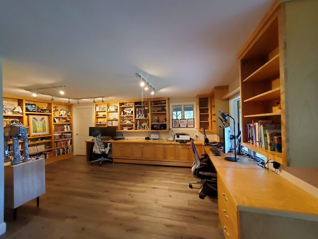 644 Methodist Hill Rd, Enfield, NH 03748 - office area with wood finished floors, a baseboard heating unit, and track lighting