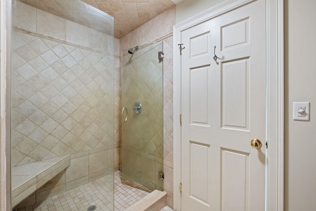 bathroom with a shower stall