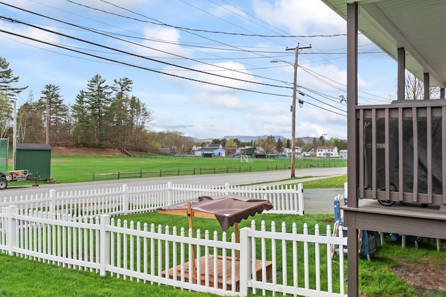 view of yard featuring a sunroom