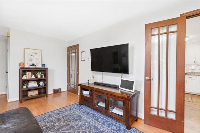 living area featuring wood finished floors