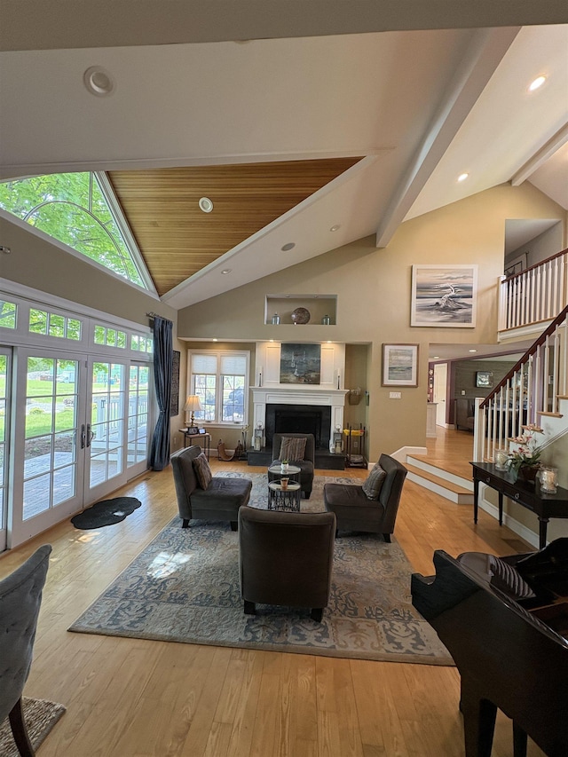 28-28A Ridge Rd, Hollis, NH 03049 - living room with wood finished floors, stairway, a fireplace, french doors, and recessed lighting