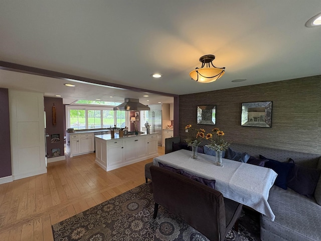 28-28A Ridge Rd, Hollis, NH 03049 - dining room featuring an accent wall, wallpapered walls, light wood-type flooring, baseboards, and recessed lighting