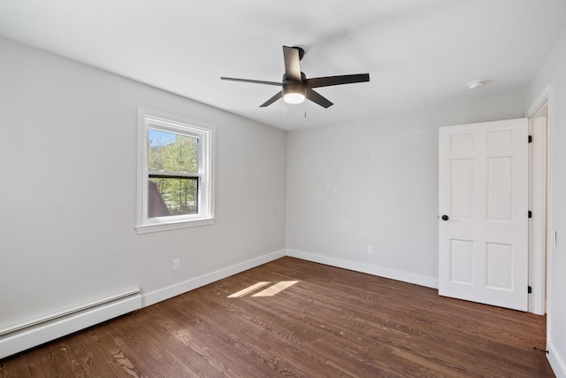 41 Elk Dr, Bedford, NH 03110 - empty room featuring baseboard heating, wood finished floors, a ceiling fan, and baseboards