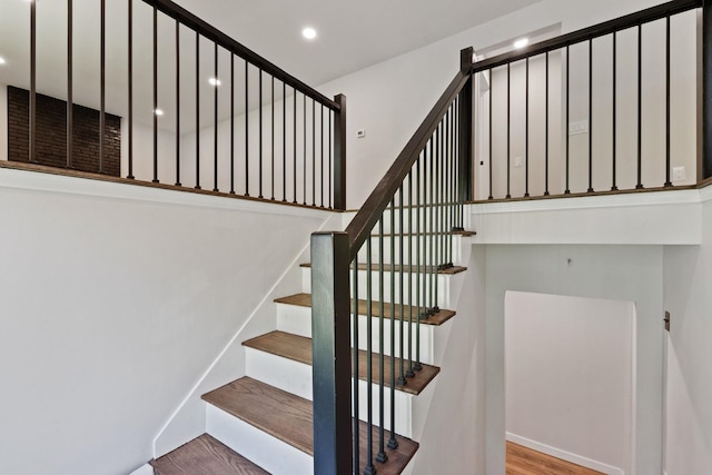 41 Elk Dr, Bedford, NH 03110 - stairway featuring wood finished floors and recessed lighting