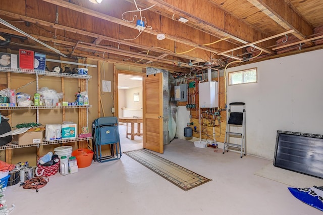 basement with electric panel and water heater