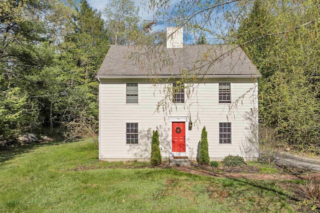 268 Lesmerises Rd, Loudon, NH 03307 - colonial inspired home featuring a front lawn, entry steps, a chimney, and roof with shingles