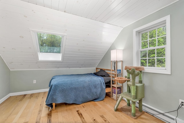 268 Lesmerises Rd, Loudon, NH 03307 - bedroom featuring a baseboard radiator, lofted ceiling, light wood-style floors, baseboards, and wooden ceiling