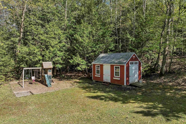 268 Lesmerises Rd, Loudon, NH 03307 - view of shed featuring a playground and a forest view