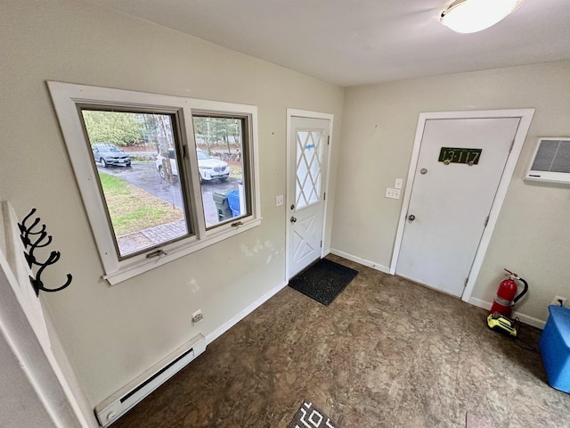 foyer featuring a baseboard radiator and baseboards