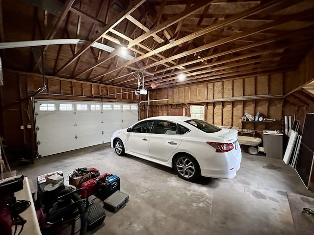 garage featuring a garage door opener