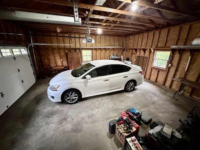 garage featuring a garage door opener