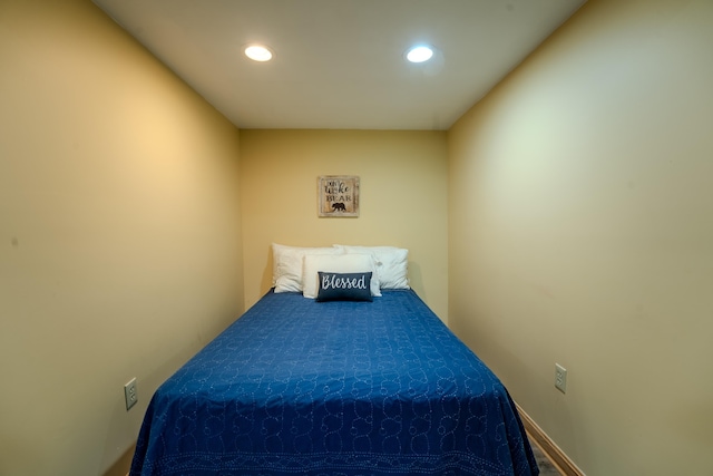 bedroom with recessed lighting